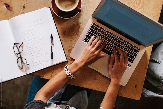 Laptop, Coffee Mug, Paper, Pen and Sonam Ke Shabd
